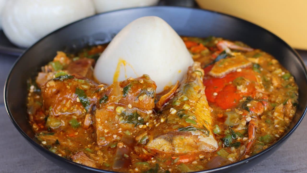 Banku with okra stew and fish