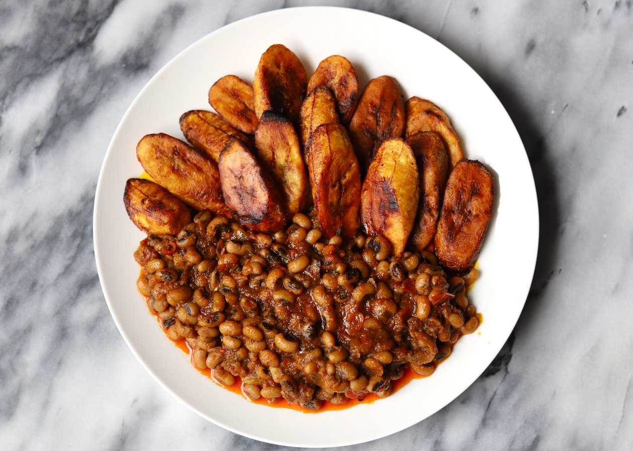 Gari and beans with fried plantain